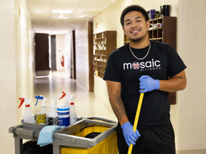 Mosaic Alliance image of a man doing janitorial work
